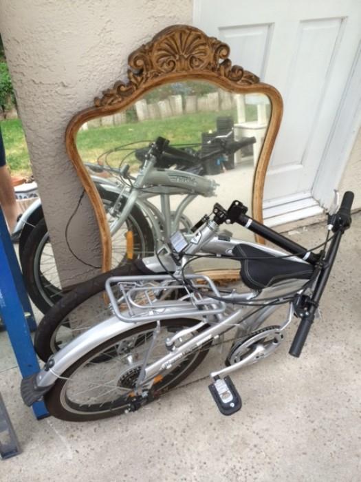 antique mirror and folding bike