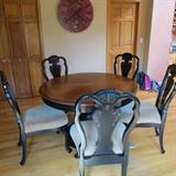 48" round table with one 20" leaf and 5 chairs