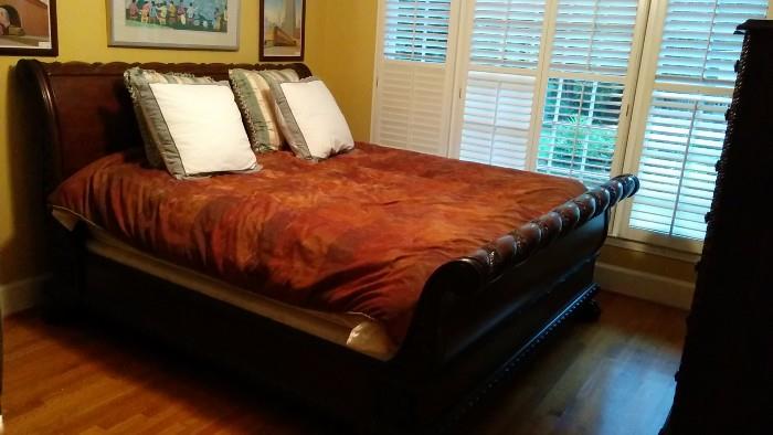 Here ya go: A King sized mahogany Bernhardt sleigh bed. Solid wood construction, guaranteed to cause physical deformity, hernias, spinal injury, etc., if you don't hire an olympic athlete to load this into your Prius - it is H E A V Y!