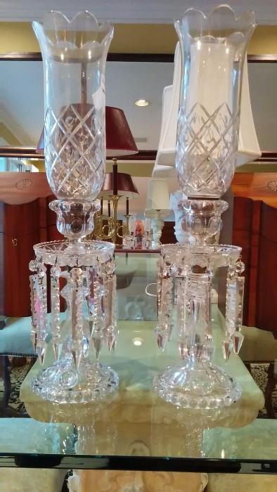 Pair of vintage cut glass candleholders with hurricanes.