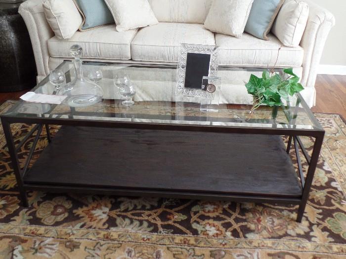 Wrought iron, wood and glass coffee table. 