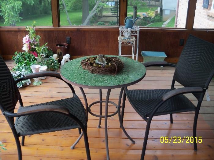 small patio table with two chairs