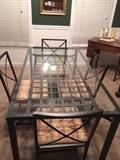 Ikea glass table. Like new, with 4 matching chairs. This Table is very, very sturdy and heavy.