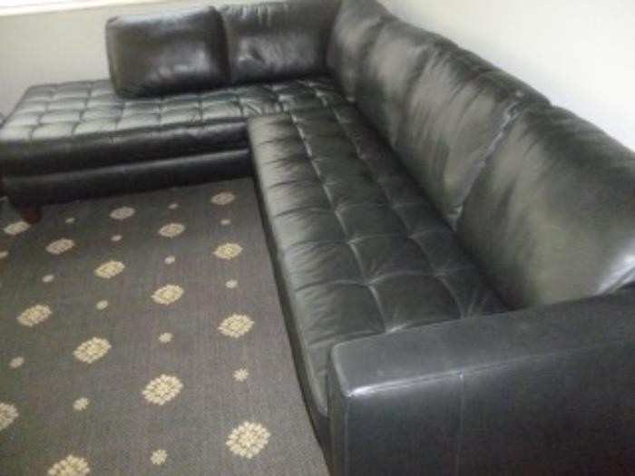 L-shaped Black Leather Couch by Natuzzi (80" x 75") $800