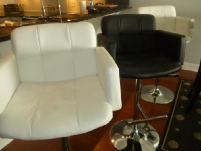 Leather Adjustable Stools in Black (2) or White (2) Leather/32"/Priced per stool $60