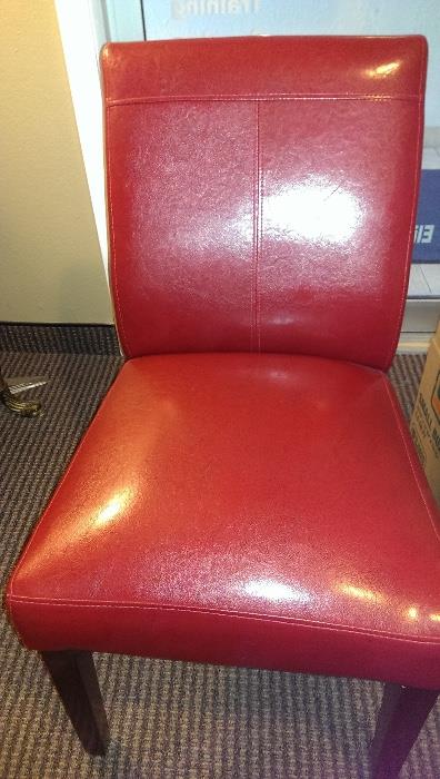 Red leather Armless Chair/ Priced per chair/ (2) $45