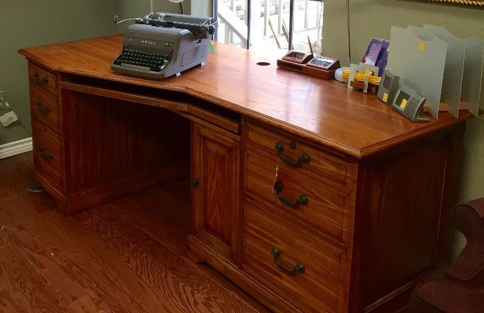 Winner's Only oak desk.