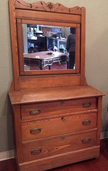 Antique Eastlake oak dresser with swing mirror