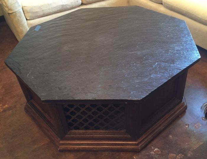 Mid-century octagonal coffee table with slate top.