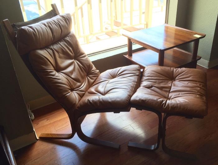 Mid-century modern Westnova leather chair with ottoman and Willett end table (one of two)