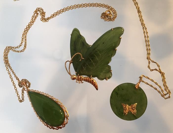 Two beautiful jade and 14K gold necklace plus a jade and gold butterfly pin.