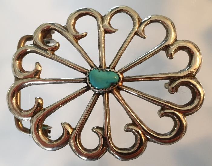 Sterling and turquoise belt buckle.