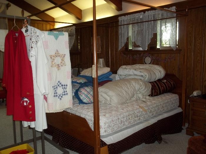 Four poster king sized bed with matching dresser and chest