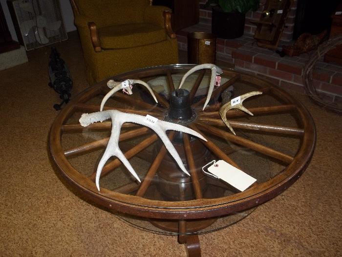Authentic glass topped wagon wheel coffee table