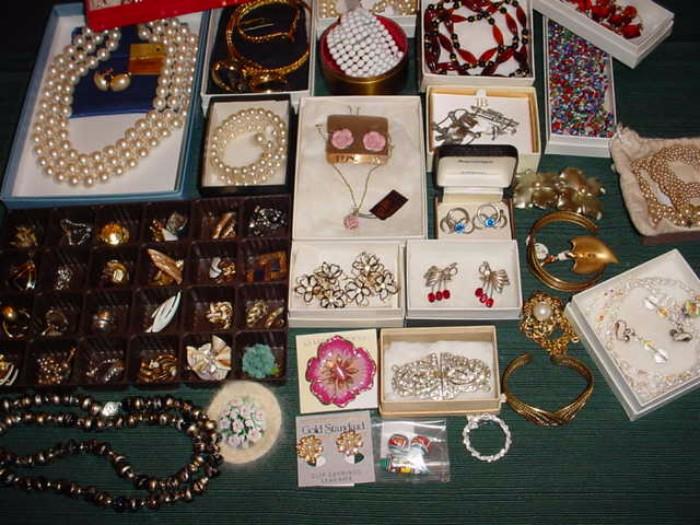 Earrings, brooches, bracelets, and necklaces