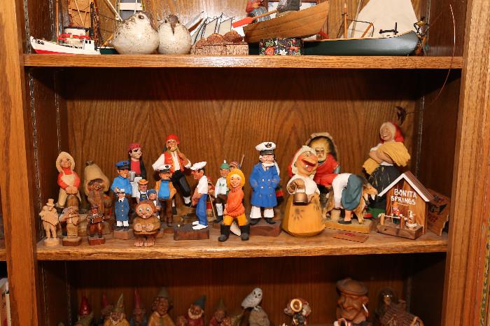 Brighten up someone's day with a happy collectible wood carving!