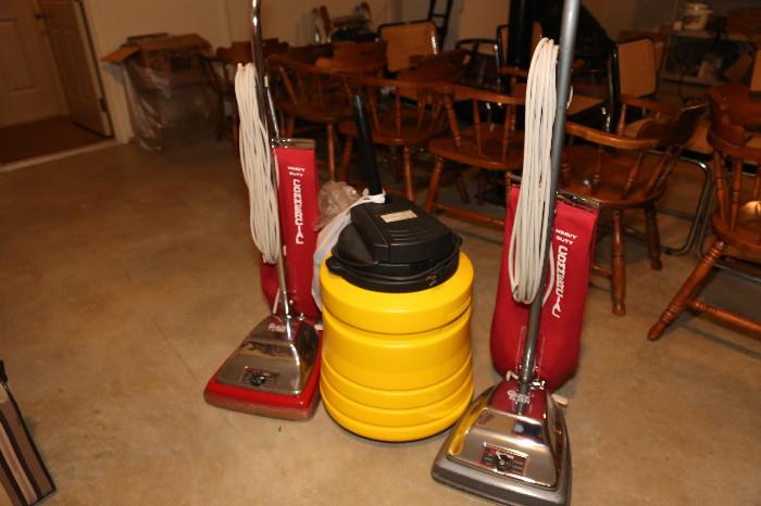 Genie Shop vac with attachments, hoses, etc. Two uprights will have your back saying thank you!