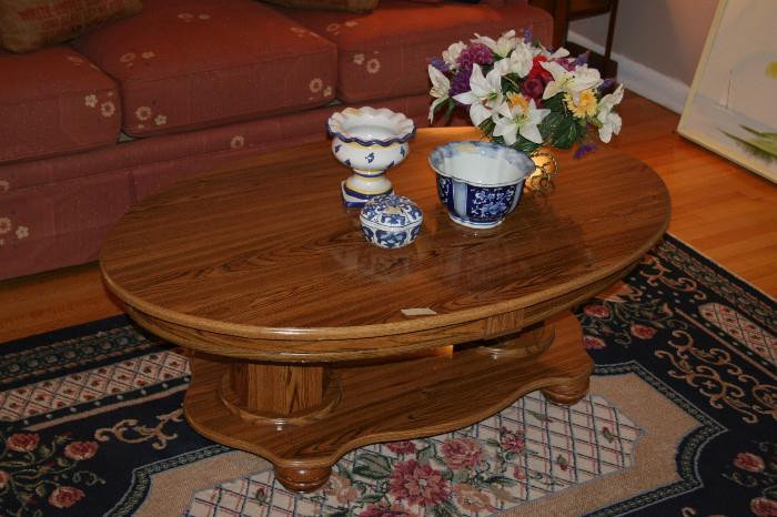 Oval pedestal coffee table