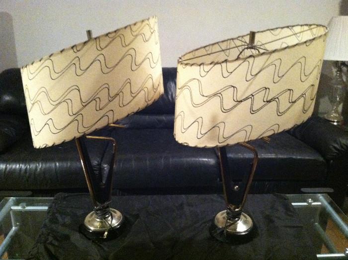 1950s "atomic" style lamps. Excellent condition for their age -- and note the asymmetrical shades are blemish-free.