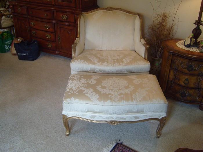 Drexel 1 1/2 sized French Victorian style chair and matching ottoman
