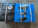 Delta 10 inch drill press.  Brand new.  Still in box. Never been used.