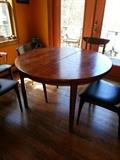 Mahogany round table with 2 leaves $250.00