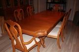 Solid oak dinning room table w/6 chairs and china cabinet