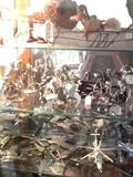Pewter dragons, etc. Small planes. Some fishing reels and much more.