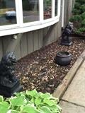 Pair of striking concrete lions