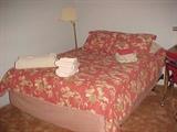 Queen Size Bed, Bedding & Floor Lamp