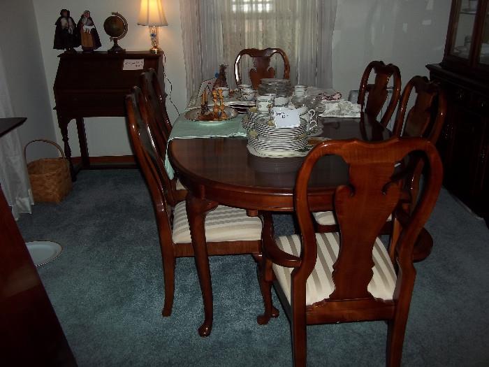 beautiful cherry dining table/6 chairs