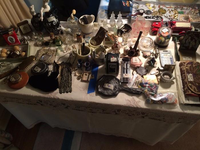 pipes, whiting davis mesh purses, prince albert in a can,  perfume bottles, etc,,,...