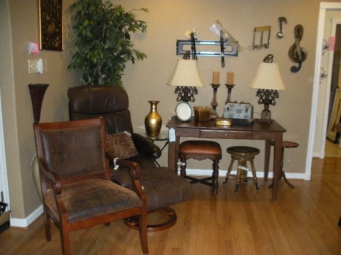 Leather chair with stool, desk, lamps, antique piano stool, TV wall mount can be removed from wall, greenery