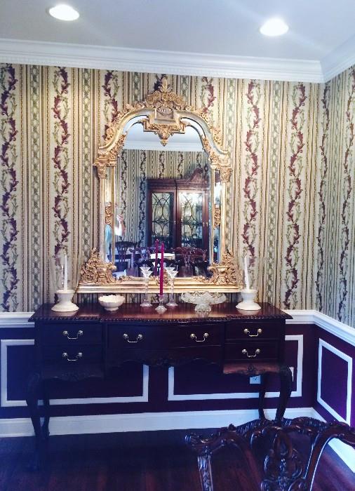 Matching Mahogany Side Board / Server hand crafted and imported from Indonesia. Decorative Mirror and various Lenox and crystal pieces.