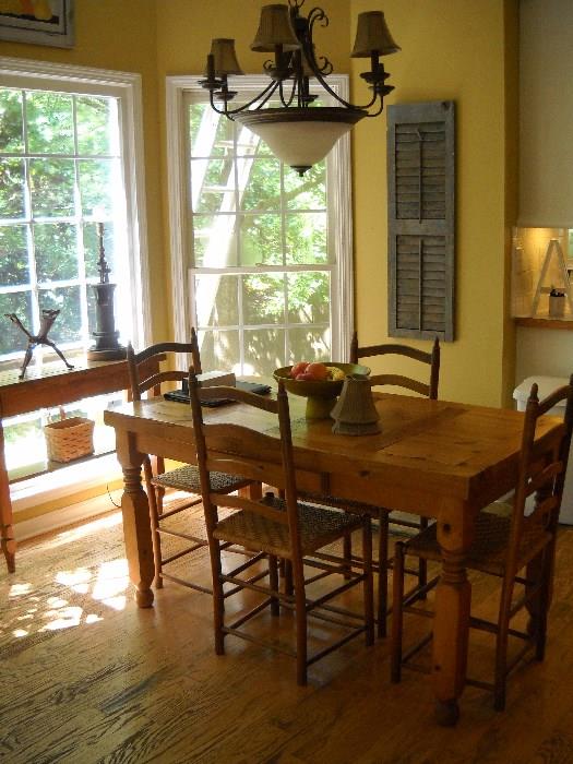 Pine block table with antique ladder back chairs