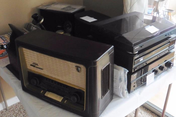 Newer Sony turntable. Sony CD player. Insignia receiver (newer). Vintage Grundig radio in working condition. Nice!