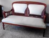 Beautiful mahogany settee on castors. Great condition.