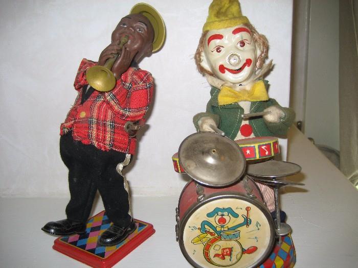 Mechanical Louis Armstrong and clown toys