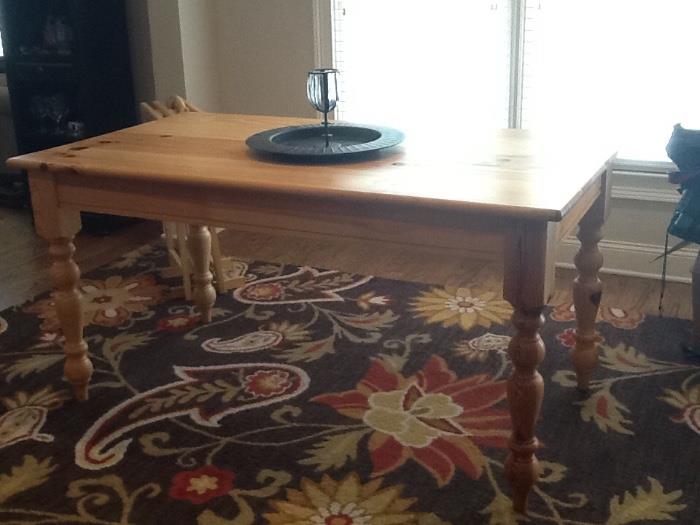Farm table and hooked wool area rug