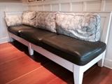 Custom bench with three different cushion covers for a change of seasons or look! Could be retrofitted to remove end piece so it is open at both ends