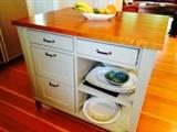 Custom built kitchen island with cherry top 33 x42 x36h color is a soft green all drawers have full glides.