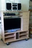 TV/media cabinet on casters (TV is NOT for sale)