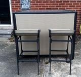 outdoor patio bar with four stools