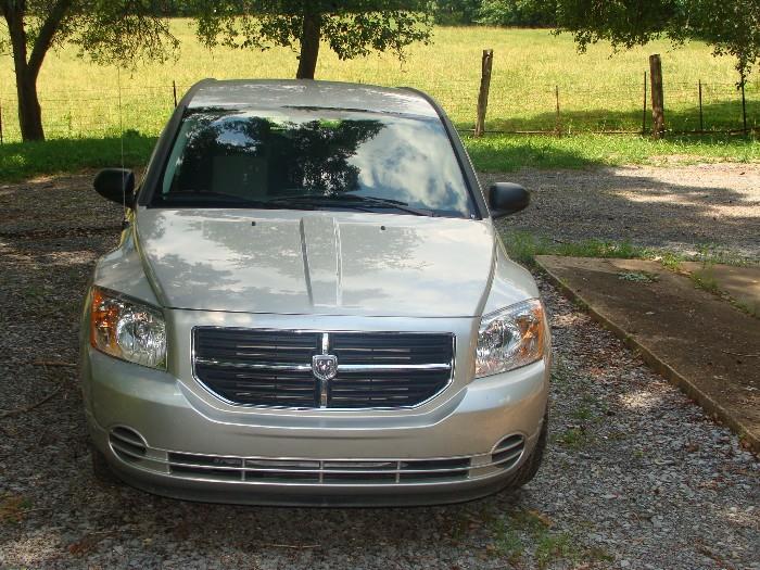 2009 Dodge Caliber with 17,030 original miles in like new condition! Features: SXT, 2.0L, Air, Power Windows, Doors, Mirrors, Tilt Wheel, Cruise, CD & MP3 ***  Plus Vintage Flatbed Truck!
