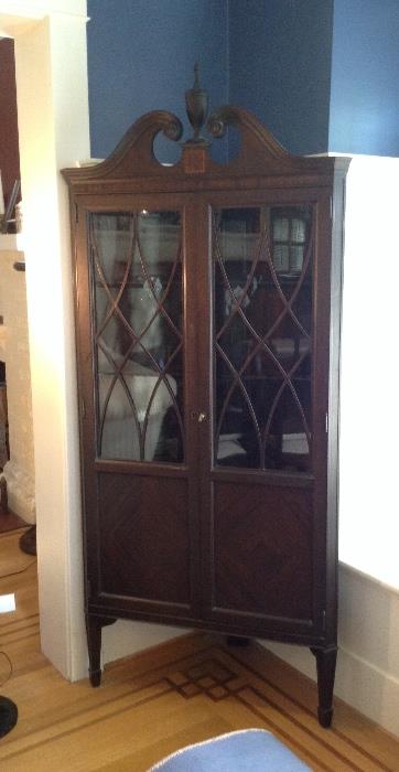 Petite mahogany corner china cabinet with key - 74" to top of finial
