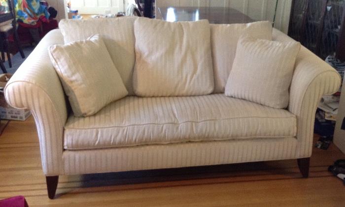 Ethan Allen ivory striped sofa (loveseat) with feather pillows - 6.5 ft. long