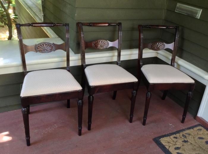 3 of a set of 7 mahogany chairs - finish & upholstery are in good condition.