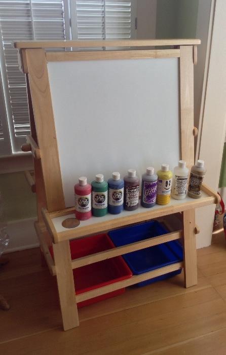 Kids double-sided art easel - the other side is a chalkboard.  Some paint & brushes too.