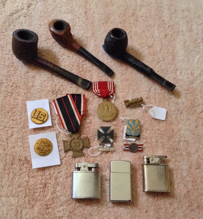 Vintage pipes, military medals & pins, vintage lighters (L to R: Contintental, Zippo & BeBe 365 Germany)