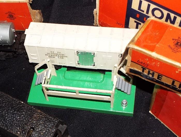 ANTIQUE 1950'S LIONEL TRAIN "O" GAUGE SET WITH ORIGINAL BOXES (HAVE WEAR) INCLUDES CABOOSE, COAL CAR, OIL TANKER, MILK CAR AND ENGINE ALSO TRACK AND MOTOR AND MORE!!!